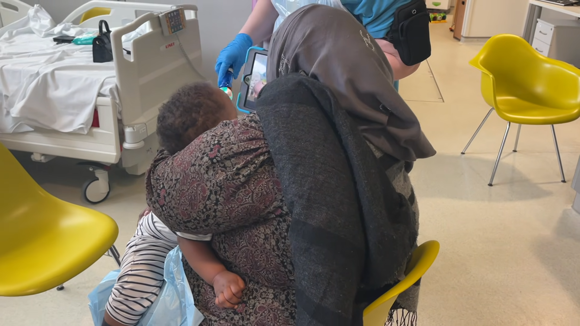 Toddler straddle position on parent's lap